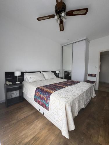 Postel nebo postele na pokoji v ubytování Montecarlo Hotel & Apart