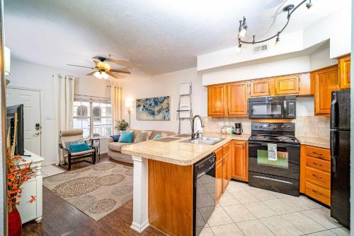 a kitchen with a sink and a stove at Cozy Enclave Bursting with Amenities in Lago Vista