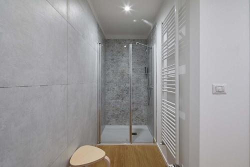 a bathroom with a shower and a toilet in it at Casa Morellato in Riva del Garda