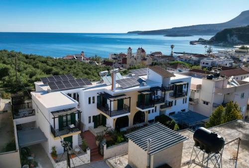 an image of a house with solar panels on the roof at Elysian Garden in Kalyves