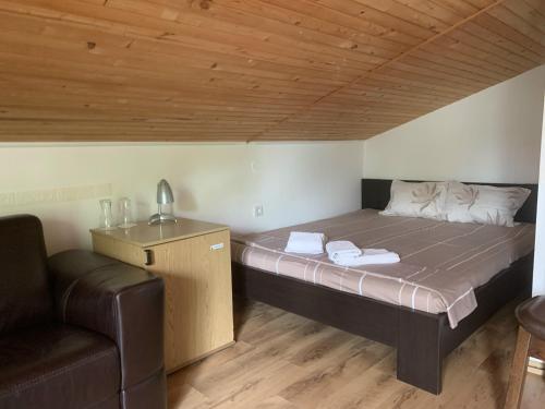 Postel nebo postele na pokoji v ubytování Villa Maxim