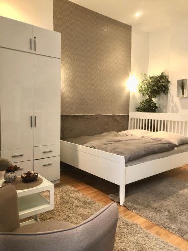 Posteľ alebo postele v izbe v ubytovaní Diamond Apartman