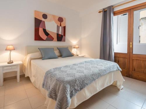 En eller flere senge i et værelse på Apartment Voltor 1A By Sunvillas Mallorca