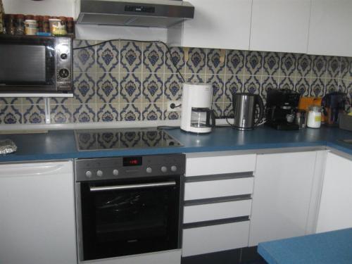 Η κουζίνα ή μικρή κουζίνα στο Ferienwohnung Plaggemars Verm nur Sonntag auf Samstag