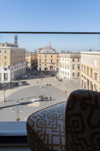 a view of a large city from a window at Abalto Suites & Rooms in Lecce