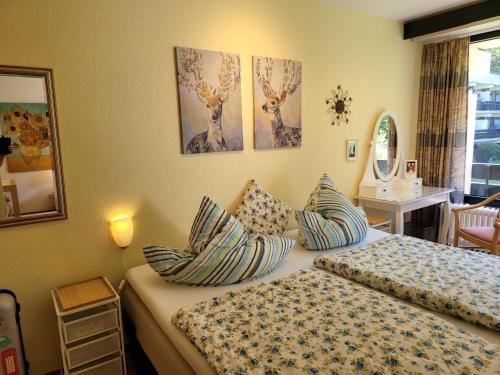 a bedroom with two beds with pillows on them at Alpenschwänchen 2 - Salzschwänchen in Bad Reichenhall