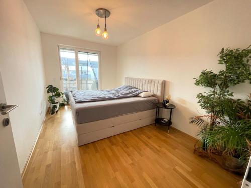 Ένα ή περισσότερα κρεβάτια σε δωμάτιο στο Modern bright apartment