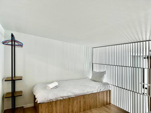 Postel nebo postele na pokoji v ubytování Hotel Krebuli