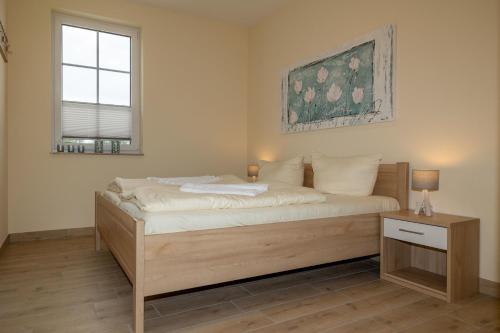 Seewohnung "Hiddensee"にあるベッド
