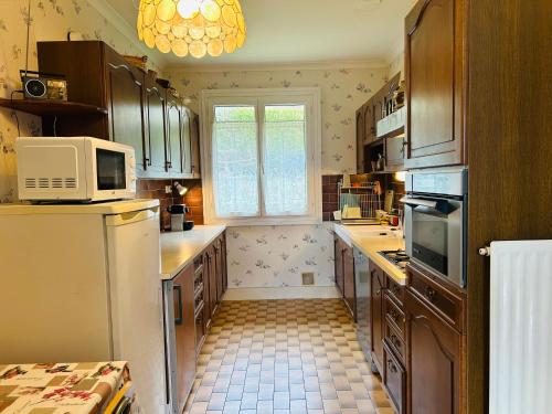 Køkken eller tekøkken på Maison de Famille Vintage Cosy