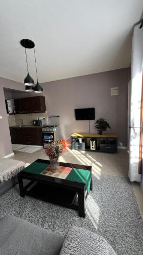 a living room with a couch and a table at FlexHomes-Ongata Rongai in Ongata Rongai 