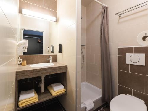 Koupelna v ubytování Hotel Kristoffel - Ontbijt inbegrepen