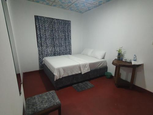 Voodi või voodid majutusasutuse Charm Spring Ella toas