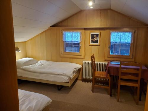 Postel nebo postele na pokoji v ubytování Hotel Garni Alpenruh
