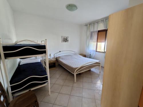 Postel nebo postele na pokoji v ubytování Ketty