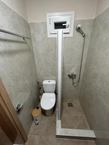 Un baño de Elysian Apartments