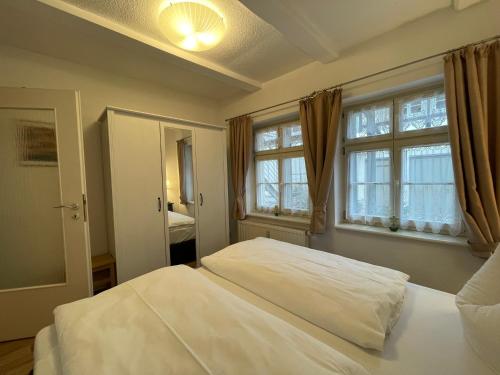 Ένα ή περισσότερα κρεβάτια σε δωμάτιο στο Apartment No6