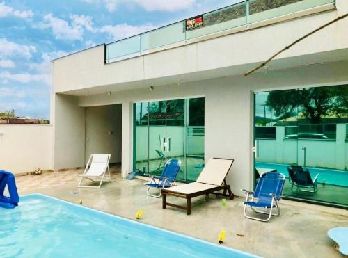 Πισίνα στο ή κοντά στο Casa Matinhos 100m do mar