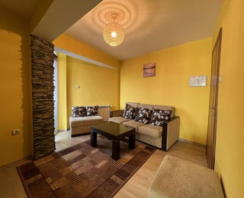 Ruang duduk di ALPHA family HOTEL