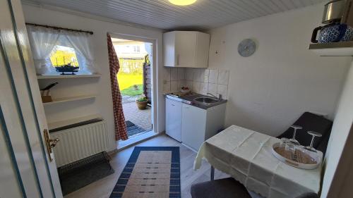 Kuchyň nebo kuchyňský kout v ubytování Appartement Nummer 26
