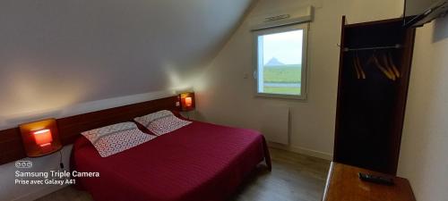 Postel nebo postele na pokoji v ubytování Etoile des Grèves