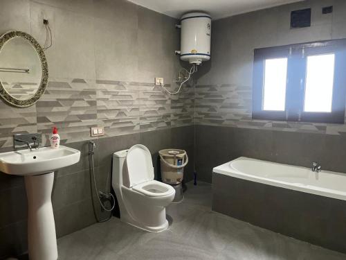 Koupelna v ubytování REEMA INN