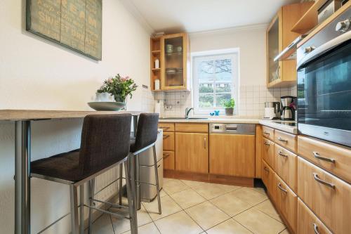 Dapur atau dapur kecil di Ankerplatz - Fewo mit Garten, nur wenige Meter zum Strand