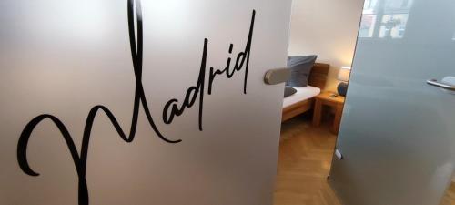 a room with a door with the word meditation written on it at Apartment Madrid Garten & Pool als Extra möglich barrierefrei in Mühlhausen