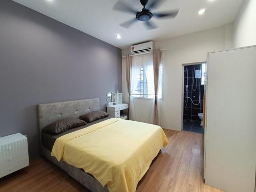 Ένα ή περισσότερα κρεβάτια σε δωμάτιο στο Empire Citystay at Moyan-4Queen