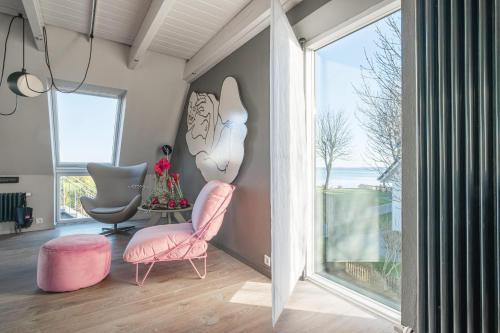 Posezení v ubytování Haifischsieben, Wow-Haus mit Meerblick, Sauna und Kamin