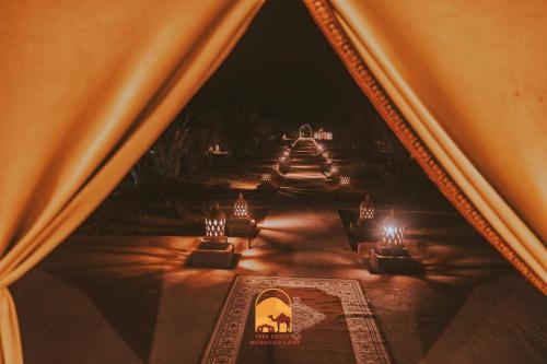 an overhead view of a table with candles and lights at Trek desert Morocco Sarl in Taouz