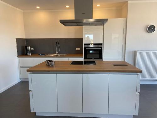 Kuchyň nebo kuchyňský kout v ubytování Ferienhaus Sundowner FH6