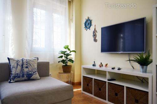 TV a/nebo společenská místnost v ubytování Apartamento Villaverde - parking en el centro