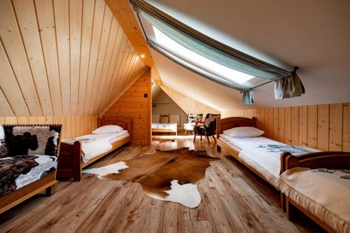 Postel nebo postele na pokoji v ubytování Apartament Górski u Papierzy Sauna, Jacuzzi, SPA