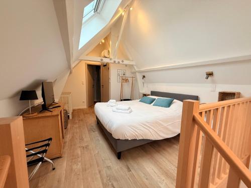 Cama o camas de una habitación en SensUP à 5min de Pairi Daiza