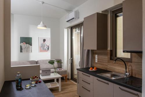 Kuchyň nebo kuchyňský kout v ubytování Enea City Suites