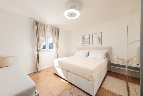 Postel nebo postele na pokoji v ubytování Apartman BILI