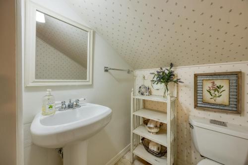 a bathroom with a sink and a toilet and a mirror at Luxury Wine Country Haven Vineyard Views Near Top Wineries Adelaida Farmhouse in Paso Robles