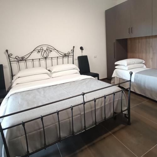Ένα ή περισσότερα κρεβάτια σε δωμάτιο στο Borgo Ragnitill