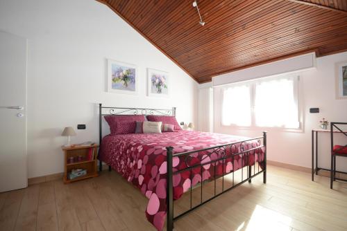 Кровать или кровати в номере Appartamento Franca