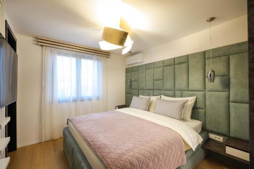 Postel nebo postele na pokoji v ubytování Residence 8