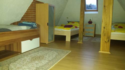Postel nebo postele na pokoji v ubytování Ferienwohnung "Am Vaterlandsgrubenweg"