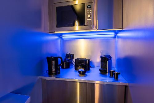 Kuchyň nebo kuchyňský kout v ubytování L'Eclipsina - Logement Insolite dans un Univers Futuriste
