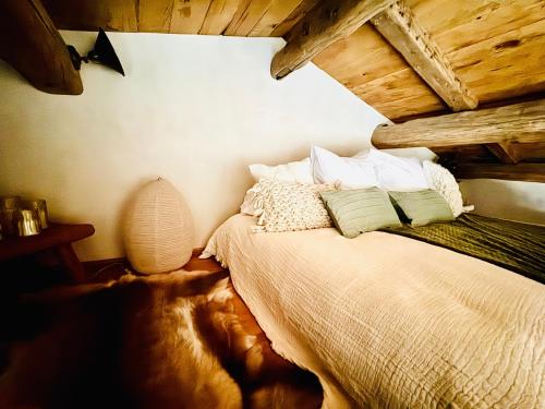 En eller flere senge i et værelse på Demeure moresca