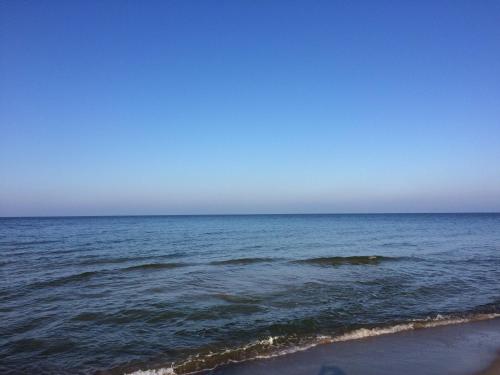 a view of the ocean from the beach at Wy & Spa in Pobierowo