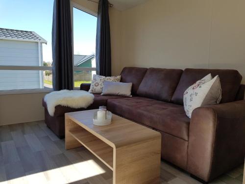 Χώρος καθιστικού στο Chalet Schwarzkopfmöwe am Kransburger See 549