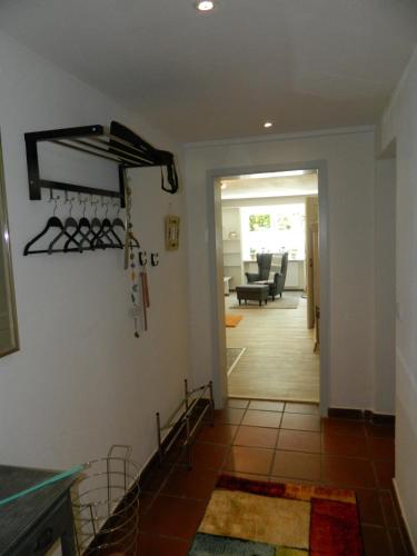 a hallway of a home with a dining room at Helle Komfortwohnung in Möhnesee