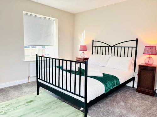 Ένα ή περισσότερα κρεβάτια σε δωμάτιο στο Cozy 3 Bed Thetford Home with WiFi Sleeps 5 Comfortably