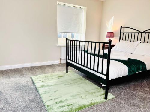 Ένα ή περισσότερα κρεβάτια σε δωμάτιο στο Cozy 3 Bed Thetford Home with WiFi Sleeps 5 Comfortably