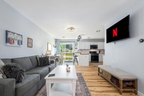 a living room with a couch and a table at Platte River Play Lovely 2bdr Barnhouse 2852 in Beulah